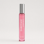 Sabotage Essence 10ml travel spray perfume bottle with clear glass, black cap, and vertical branding against a light background