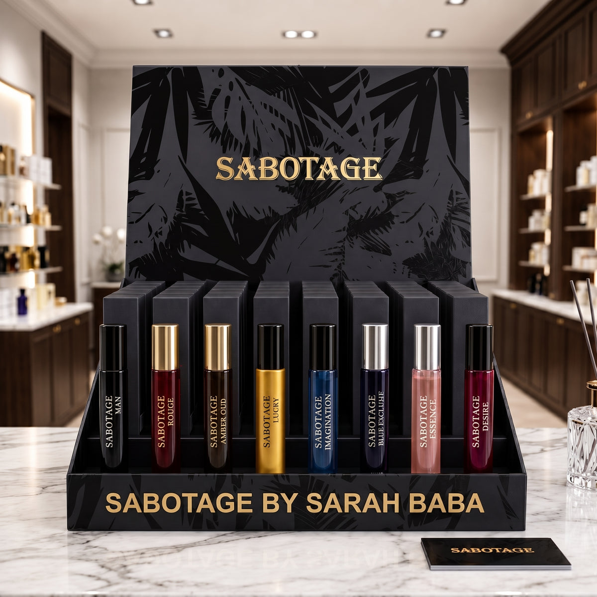 Sabotage Scents luxury countertop fragrance display stand featuring the complete 8-scent collection and tester bottles.